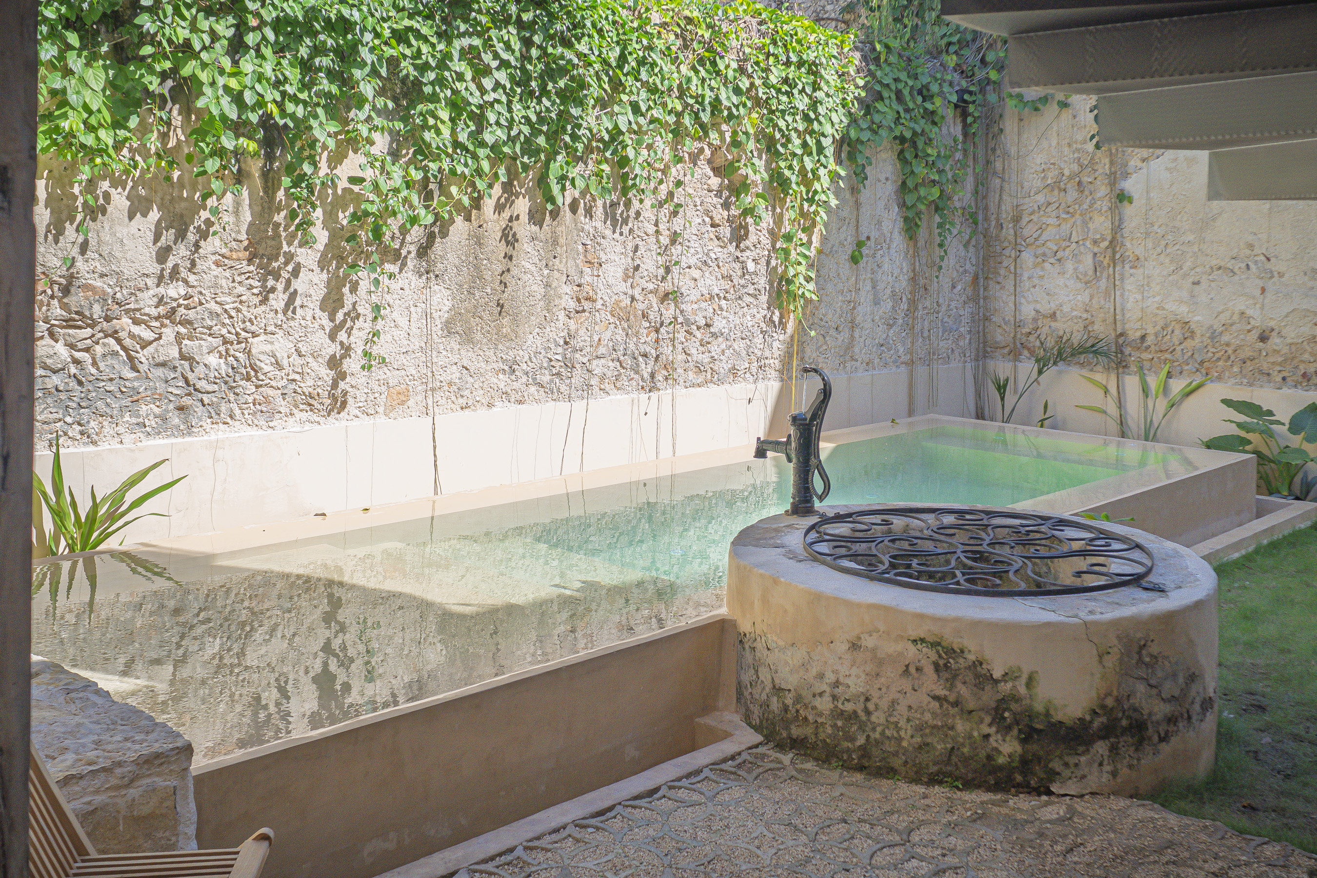 Piscina y jardín de Cien Sueños